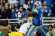 Nov 28, 2013; Detroit, MI, USA; Green Bay Packers cornerback Sam Shields (37) intercepts a pass intended for Detroit Lions wide receiver Calvin Johnson (81) during the third quarter of a NFL football game on Thanksgiving at Ford Field. Mandatory Credit: A