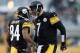 PITTSBURGH, PA - DECEMBER 08: Antonio Brown #84 and Ben Roethlisberger #7 of the Pittsburgh Steelers celebrate their third quarter touchdown play against the Miami Dolphins at Heinz Field on December 8, 2013 in Pittsburgh, Pennsylvania. (Photo by Gregor