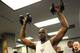 PHOENIX - FEBRUARY 21: Shaquile O'Neal of the Phoenix Suns lifts weights during practice at U.S. Airways Center on February 21, 2008 in Phoenix, Arizona. NOTE TO USER: User expressly acknowledges and agrees that, by downloading and or using this Photograp