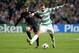 GLASGOW, SCOTLAND - OCTOBER 01: Giorgos Samaras of Celtic holds off Pedro of Barcelona during the UEFA Champions League Group H match between Celtic and FC Barcelona at Celtic Park Stadium on October 1, 2013 in Glasgow, Scotland. (Photo by Jeff J Mitche
