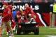 Dec 8, 2013; Phoenix, AZ, USA; Arizona Cardinals player Tyrann Mathieu (32) reacts as he is taken off the field after suffering an injury in the third quarter against the St. Louis Rams at University of Phoenix Stadium. The Cardinals defeated the Rams 30-