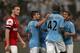 BEIJING, CHINA - JULY 27: Yaya Toure (#42) of Manchester City celebrates with team-mates after scoring during the pre-season Asian Tour friendly match between Arsenal and Manchester City at Birds Nest Stadium on July 27, 2012 in Beijing, China. (Photo by