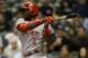 MILWAUKEE, WI - SEPTEMBER 13: Brandon Phillips #4 of the Cincinnati Reds singles in the top of the first inning against the Milwaukee Brewers at Miller Park on September 13, 2013 in Milwaukee, Wisconsin. (Photo by Mike McGinnis/Getty Images)