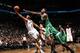 NEW YORK, NY - DECEMBER 10: Deron Williams #8 of the Brooklyn Nets shoots against Jeff Green #8 of the Boston Celtics during a game at Barclays Center on December 10, 2013 in the Brooklyn borough of New York City. NOTE TO USER: User expressly acknowledge