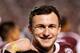 COLLEGE STATION, TX - NOVEMBER 09: Johnny Manziel #2 of the Texas A&M Aggies waits near the bench late in the fourth quarter during the game against the Mississippi State Bulldogs at Kyle Field on November 9, 2013 in College Station, Texas. (Photo by Sc
