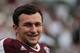 COLLEGE STATION, TX - NOVEMBER 09: Johnny Manziel #2 of the Texas A&M Aggies waits on the field before the game against the Mississippi State Bulldogs at Kyle Field on November 9, 2013 in College Station, Texas. (Photo by Scott Halleran/Getty Images)