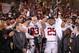 TEMPE, AZ - DECEMBER 07: Running back Tyler Gaffney #25 of the Stanford Cardinal celebrates with the Most Valuable Player trophy after defeating the Arizona State Sun Devils 38-14 in the Pac 12 Championship game at Sun Devil Stadium on December 7, 2013 i