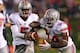EVANSTON, IL - OCTOBER 05: Braxton Miller #5 of the Ohio State Buckeyes hands off to Carlos Hyde #34 against the Northwestern Wildcats at Ryan Field on October 5, 2013 in Evanston, Illinois. Ohio State defeated Northwestern 40-30. Photo by Jonathan Daniel