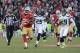 December 8, 2013; San Francisco, CA, USA; San Francisco 49ers running back Frank Gore (21) runs past Seattle Seahawks cornerback Richard Sherman (25) and free safety Earl Thomas (29) during the fourth quarter at Candlestick Park. The 49ers defeated the Se