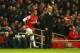LONDON, ENGLAND - NOVEMBER 23: Theo Walcott of Arsenal comes on a substitute watched by manager Arsene Wenger during the Barclays Premier League match between Arsenal and Southampton at Emirates Stadium on November 23, 2013 in London, England. (Photo by