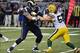 Aug 17, 2013; St. Louis, MO, USA; St. Louis Rams tackle Jake Long (77) defends against Green Bay Packers outside linebacker Clay Matthews (52) during the first half at the Edward Jones Dome. Mandatory Credit: Scott Rovak-USA TODAY Sports