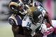 Oct 6, 2013; St. Louis, MO, USA; Jacksonville Jaguars wide receiver Justin Blackmon (14) is tackled by St. Louis Rams cornerback Janoris Jenkins (21) during the first half at The Edward Jones Dome. Mandatory Credit: Scott Kane-USA TODAY Sports