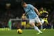 MANCHESTER, ENGLAND - DECEMBER 01: James Milner of Manchester City in action during the Barclays Premier League match between Manchester City and Swansea City at the Etihad Stadium on December 1, 2013 in Manchester, England. (Photo by Clive Brunskill/Ge