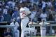 October 16, 2013; Los Angeles, CA, USA; Los Angeles Dodgers left fielder Carl Crawford (25) crosses home plate after hitting a solo home run in the fifth inning against the St. Louis Cardinals in game five of the National League Championship Series baseba