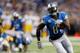 DETROIT, MI - NOVEMBER 28: Calvin Johnson #81 of the Detroit Lions runs for a third quarter touchdown while playing the Green Bay Packers at Ford Field on November 28, 2013 in Detroit, Michigan. (Photo by Gregory Shamus/Getty Images)