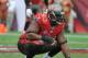 TAMPA, FL - NOVEMBER 17: Defensive tackle Gerald McCoy #93 of the Tampa Bay Buccaneers sets for play against the Atlanta Falcons November 17, 2013 at Raymond James Stadium in Tampa, Florida. Tampa won 41 - 28. (Photo by Al Messerschmidt/Getty Images)