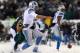 PHILADELPHIA, PA - DECEMBER 08: Matthew Stafford #9 of the Detroit Lions fumbles the ball as he tackled by Mychal Kendricks #95 of the Philadelphia Eagles on December 8, 2013 at Lincoln Financial Field in Philadelphia, Pennsylvania.The Philadelphia Eagle