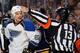 BUFFALO, NY - NOVEMBER 19: Referee Dan O'Halloran #13 signals Chris Stewart #25 of the St. Louis Blues for a minor penalty in their game against the Buffalo Sabres on November 19, 2013 at the First Niagara Center in Buffalo, New York. (Photo by Bill Wipp