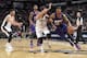 SAN ANTONIO, TX - November 6: Marcus Morris #15 of the Phoenix Suns drives to the basket against Marco Belinelli #3 of the San Antonio Spurs at the AT&T Center on November 6, 2013 in San Antonio, Texas. NOTE TO USER: User expressly acknowledges and agrees
