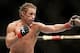 Aug 17, 2013; Boston, MA, USA; Urijah Faber fights Yuri Alcantara, not seen, during a UFC Bantamweight match at the TD Garden. Faber won by judges decision. Mandatory Credit: Winslow Townson-USA TODAY Sports