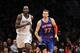Dec 5, 2013; Brooklyn, NY, USA; New York Knicks power forward Andrea Bargnani (77) has words with Brooklyn Nets power forward Kevin Garnett (2) as they run up the court after Bargnani hits a three-point basket during the fourth quarter of a game at Barcla
