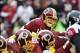 Oct 7, 2012; Landover, MD, USA; Washington Redskins quarterback Kirk Cousins (12) calls the signals against the Atlanta Falcons during the second half at FedEX Field. Mandatory Credit: Brad Mills-USA TODAY Sports