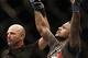 Aug 17, 2013; Boston, MA, USA; Michael Johnson celebrates his win of a UFC lightweight match at the TD Garden. Johnson won by judges decision. Mandatory Credit: Winslow Townson-USA TODAY Sports