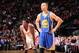 HOUSTON, TX - DECEMBER 6: Patrick Beverley #2 of the Houston Rockets and Stephen Curry #30 of the Golden State Warriors look on during the game on December 6, 2013 at the Toyota Center in Houston, Texas. NOTE TO USER: User expressly acknowledges and agre