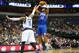 DALLAS, TX - NOVEMBER 18: Evan Turner #12 of the Philadelphia 76ers takes a shot against Shawn Marion #0 of the Dallas Mavericks at American Airlines Center on November 18, 2013 in Dallas, Texas. NOTE TO USER: User expressly acknowledges and agrees that