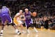 LOS ANGELES, CA - NOVEMBER 24: Isaiah Thomas #22 of the Sacramento Kings dribbles past Steve Blake #5 of the Los Angeles Lakers at Staples Center on November 24, 2013 in Los Angeles, California. NOTE TO USER: User expressly acknowledges and agrees that, b