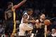 Nov 27, 2013; Brooklyn, NY, USA; Los Angeles Lakers point guard Jordan Farmar (1) steals the ball from Brooklyn Nets point guard Tyshawn Taylor (10) during the first half at Barclays Center. Mandatory Credit: Joe Camporeale-USA TODAY Sports