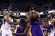 Dec 6, 2013; Sacramento, CA, USA; Los Angeles Lakers center Jordan Hill (27) controls a rebound with power forward Shawne Williams (3) against Sacramento Kings power forward Chuck Hayes (42) and shooting guard Marcus Thornton (23) during the fourth quarte