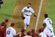 PHOENIX, AZ - AUGUST 12: Adam Eaton #6 of the Arizona Diamondbacks and teammates celebrate his game-winning, walk-off home run against the Baltimore Orioles at Chase Field on August 12, 2013 in Phoenix, Arizona. Arizona won 7-6. (Photo by Norm Hall/Getty