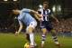 WEST BROMWICH, ENGLAND - DECEMBER 04: Samir Nasri of Manchester City moves away from James Morrison during the Premier League match between West Bromwich Albion and Manchester City at The Hawthorns on December 4, 2013 in West Bromwich, England. (Photo by