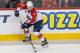 Nov 22, 2013; Calgary, Alberta, CAN; Florida Panthers defenseman Dmitry Kulikov (7) skates with the puck against the Calgary Flames during the overtime period at Scotiabank Saddledome. Calgary Flames won 4-3. Mandatory Credit: Sergei Belski-USA TODAY Spor