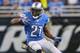 DETROIT, MI - NOVEMBER 24: Reggie Bush #21 of the Detroit Lions runs for a first down during the fourth quarter of the game against the Tampa Bay Buccaneers at Ford Field on November 24, 2013 in Detroit, Michigan. Tampa Bay defeated the Lions 24-21. (Ph
