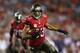 TAMPA, FL - NOVEMBER 11: Vincent Jackson #83 of the Tampa Bay Buccaneers carries the ball in the first quarter against the Miami Dolphins at Raymond James Stadium on November 11, 2013 in Tampa, Florida. (Photo by Mike Ehrmann/Getty Images)