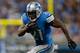 DETROIT, MI - OCTOBER 27: Reggie Bush #21 of the Detroit Lions tries to get around the end while playing the Dallas Cowboys during a fourth quarter run at Ford Field on October 27, 2013 in Detroit, Michigan. Detroit won the game 31-30.(Photo by Gregory Sh