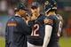 CHICAGO, IL - OCTOBER 10: Head coach Marc Trestman of the Chicago Bears talks with Josh McCown #12 and Jay Cutler #6 during a game against the New York Giants at Soldier Field on October 10, 2013 in Chicago, Illinois. The Bears defeated the Giants 27-21.