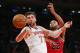 NEW YORK, NY - DECEMBER 11: Andrea Bargnani #77 of the New York Knicks and Taj Gibson #22 of the Chicago Bulls battle for the ball at Madison Square Garden on December 11, 2013 in New York City. NOTE TO USER: User expressly acknowledges and agrees that, b