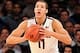 Nov 29, 2013; New York, NY, USA; Arizona Wildcats forward Aaron Gordon (11) makes a pass against the Duke Blue Devils during the NIT Season Tip-Off Championship Game at Madison Square Garden. Arizona won the game 72-66. Mandatory Credit: Joe Camporeale-US
