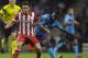 PORTO, PORTUGAL - OCTOBER 1: Koke (L) of Club Atletico de Madrid is challenged by Silvestre Varela of FC Porto during the UEFA Champions League group stage match between FC Porto and Club Atletico de Madrid held on October 1, 2013 at the Estadio do Draga