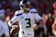 SAN FRANCISCO, CA - DECEMBER 08: Russell Wilson #3 of the Seattle Seahawks rolls out to pass against the San Francisco 49ers during the first quarter at Candlestick Park on December 8, 2013 in San Francisco, California. (Photo by Thearon W. Henderson/Ge