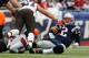 FOXBORO, MA - DECEMBER 8: Tom Brady #12 of the New England Patriots is sacked in the first half against the Cleveland Browns at Gillette Stadium on December 8, 2013 in Foxboro, Massachusetts. (Photo by Jim Rogash/Getty Images)