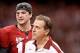 Jan 9, 2012; New Orleans, LA, USA; Alabama Crimson Tide head coach Nick Saban (front) and quarterback AJ McCarron (10) celebrate after the 2012 BCS National Championship game win over the LSU Tigers at the Mercedes-Benz Superdome. Mandatory Credit: Deric