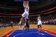 PHILADELPHIA, PA - DECEMBER 3: Evan Turner #12 of the Philadelphia 76ers reverse dunks against the Orlando Magic at the Wells Fargo Center on December 3, 2013 in Philadelphia, Pennsylvania. NOTE TO USER: User expressly acknowledges and agrees that, by dow