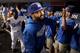 LOS ANGELES, CA - OCTOBER 07: Matt Kemp #27 of the Los Angeles Dodgers celebrates after the Dodgers defeat the Atlanta Braves 4-3 in Game Four of the National League Division Series at Dodger Stadium on October 7, 2013 in Los Angeles, California. (Photo