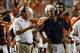 Sep 14, 2013; Austin, TX, USA; Texas Longhorns head coach Mack Brown (left) talks with defensive coordinator Greg Robinson (right) against the Mississippi Rebels during the second half at Darrell K Royal-Texas Memorial Stadium. Ole Miss beat Texas 44-23.