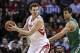 Nov 19, 2013; Houston, TX, USA; Houston Rockets center Omer Asik (3) controls the ball during the fourth quarter as Boston Celtics power forward Kris Humphries (43) defends at Toyota Center. The Rockets defeated the Celtics 109-85. Mandatory Credit: Troy