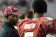 Nov 16, 2013; Tallahassee, FL, USA; Florida State Seminoles quarterback Jameis Winston (5) speaks to former quarterback Charlie Ward during the second half against the Syracuse Orange at Doak Campbell Stadium. Mandatory Credit: Melina Vastola-USA TODAY Sp